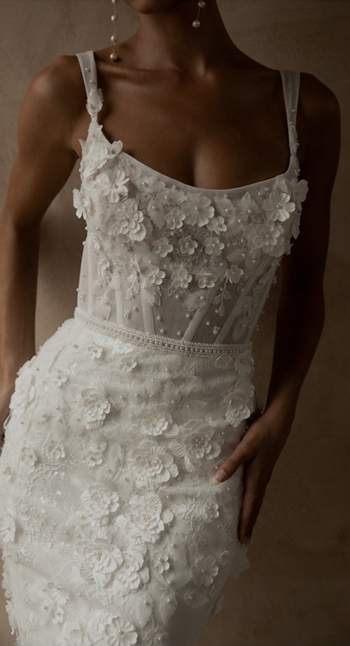 Model wearing an exclusive white gown #1