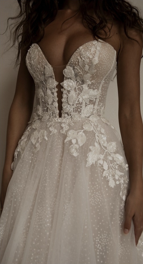 Model wearing an exclusive white gown #3