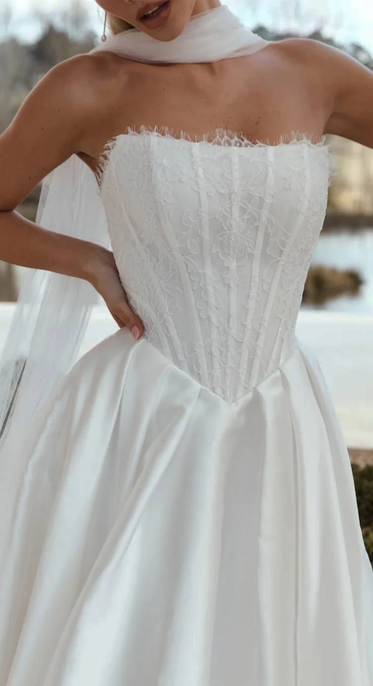 Model wearing an exclusive white gown #1