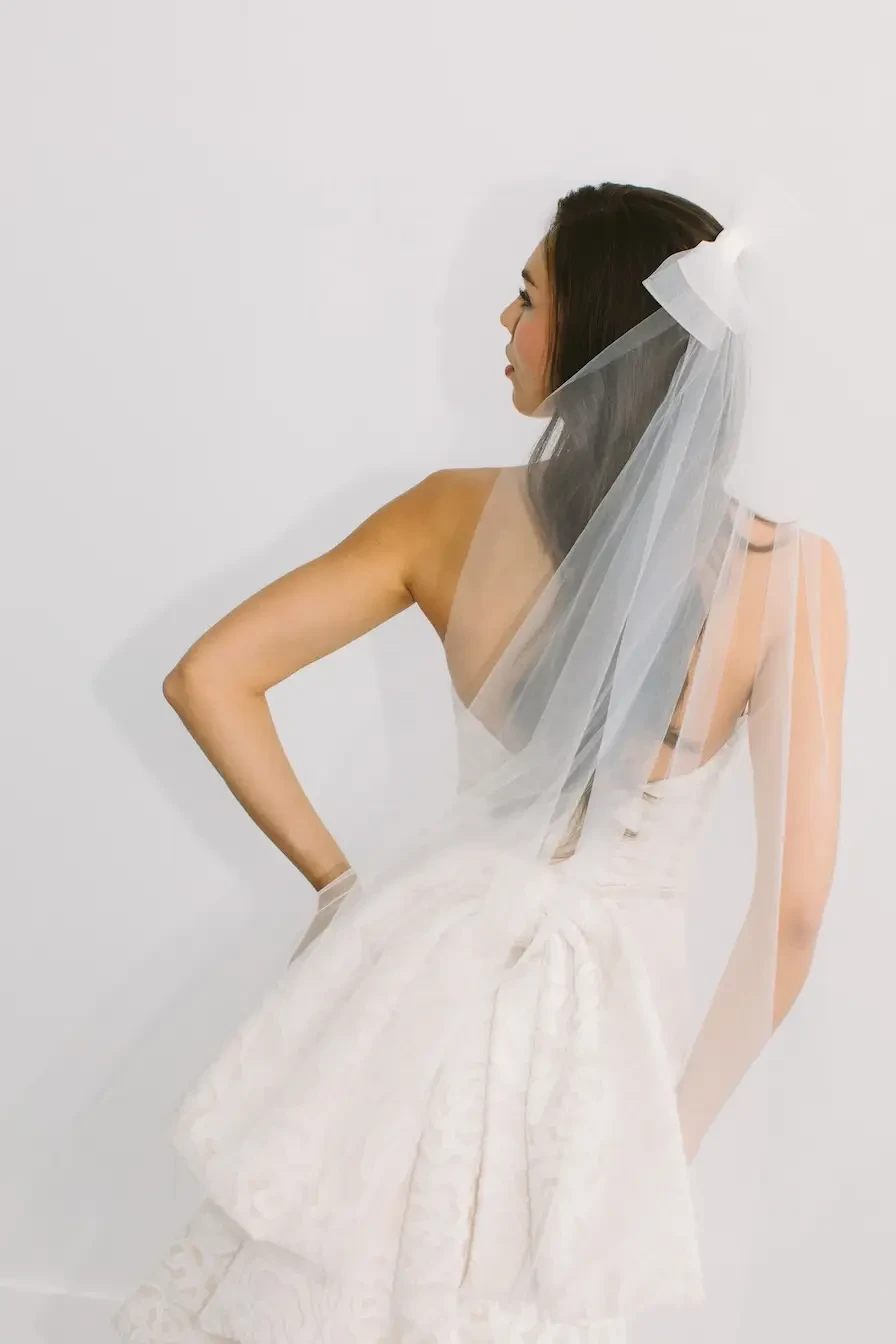Bride in wedding dress with veil for The Bridal Loft in Greenville SC
